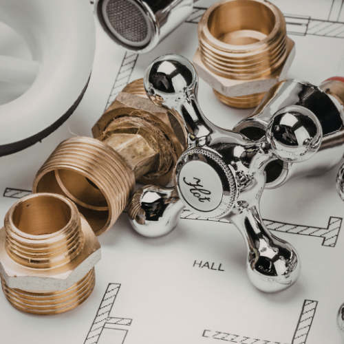 Brass plumbing fittings and a shiny, chrome 