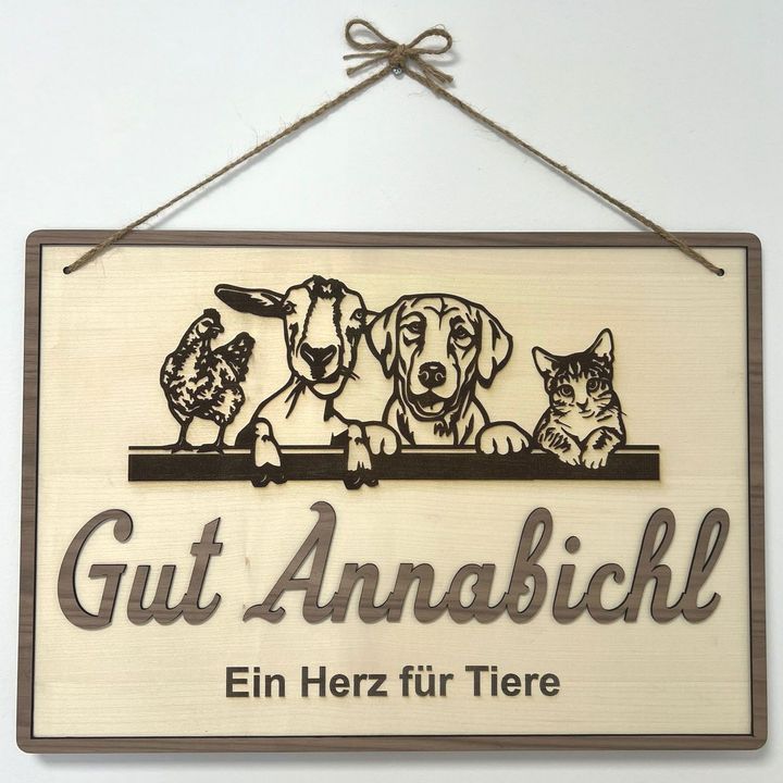 A heart shaped sign that says mama du bist das stück das uns zusammenhalt