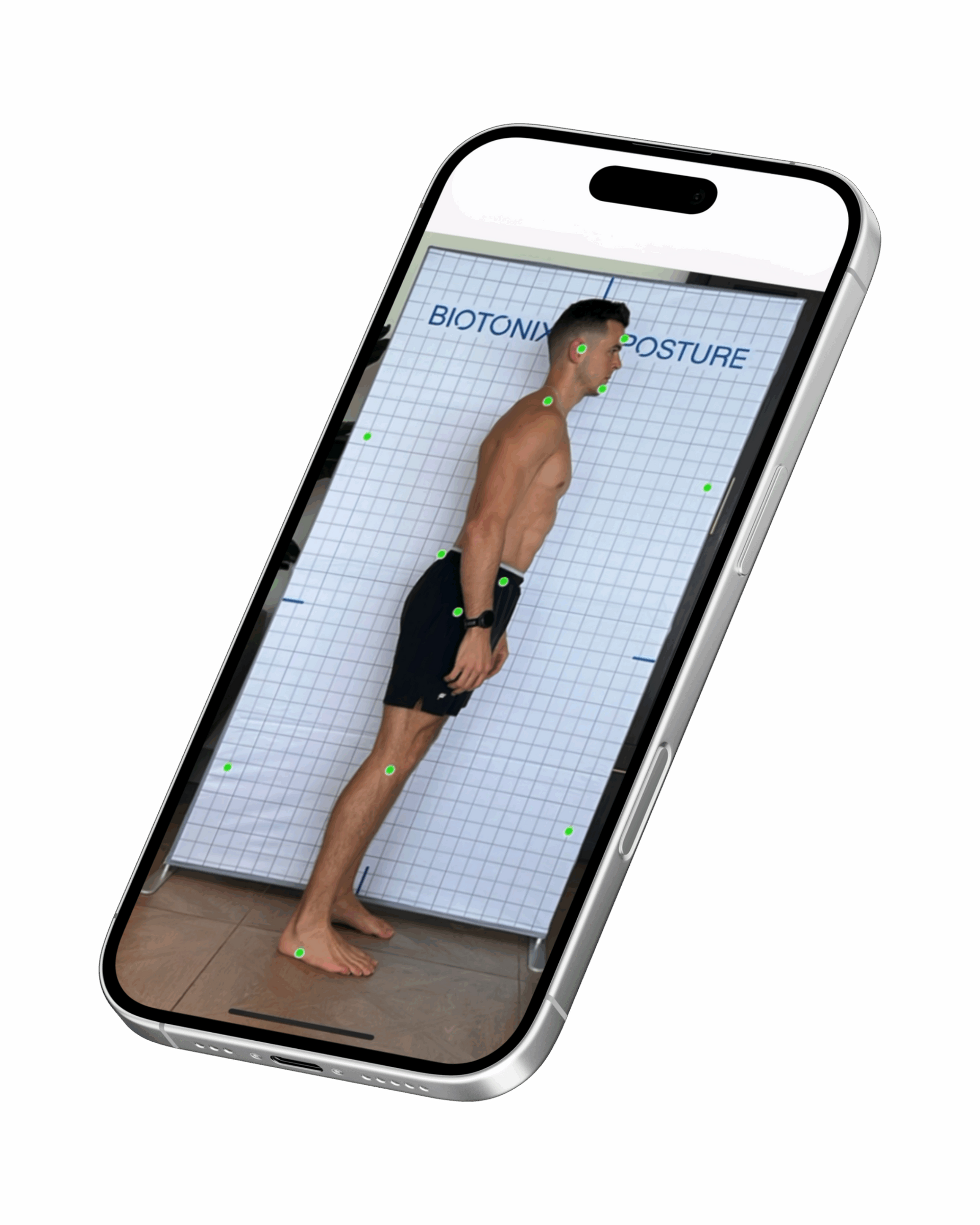 Smartphone affichant l'image d'un homme torse nu, de profil, sur un fond carrelé blanc.
