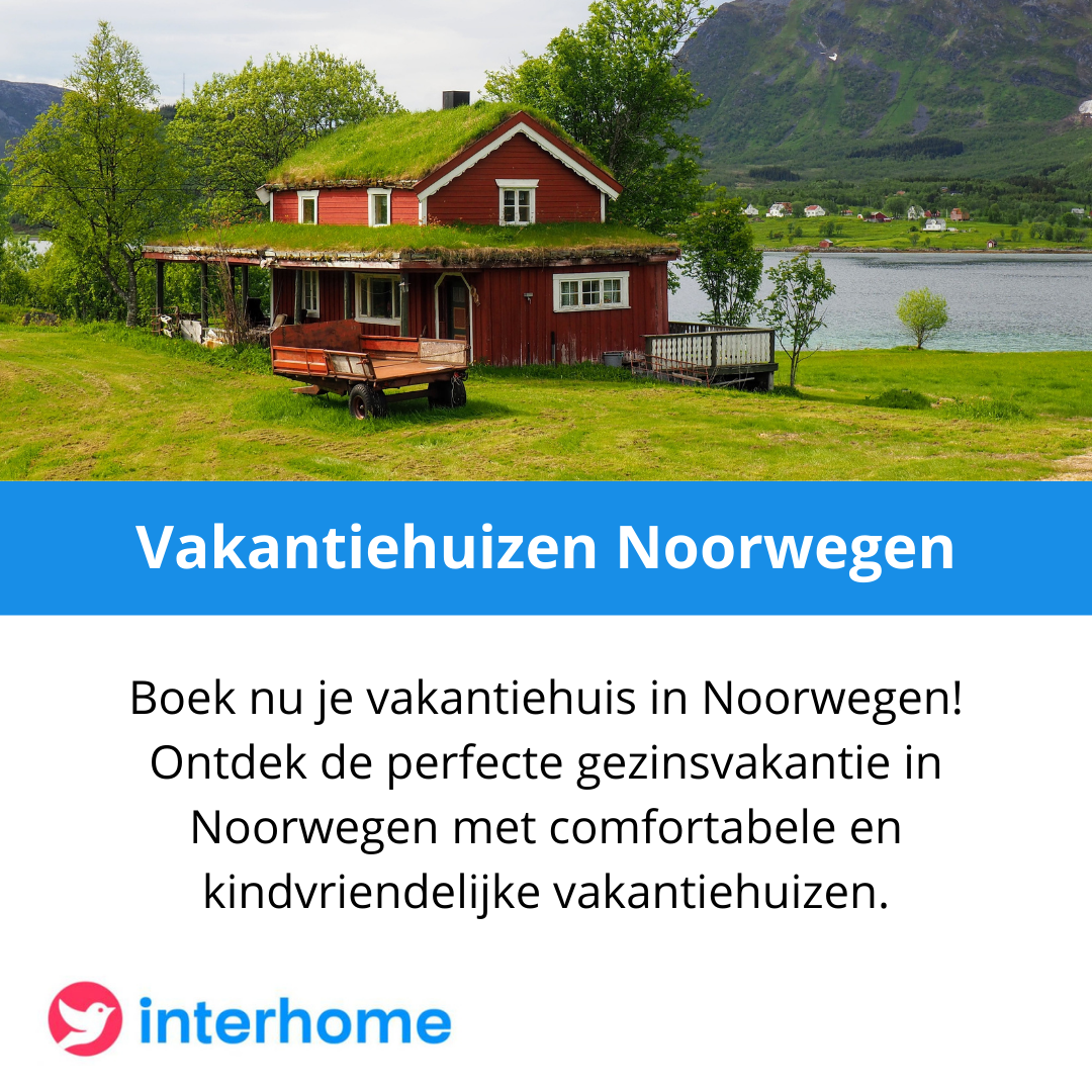 Een foto van een rood huis met een groen dak
