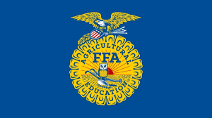 The FFA emblem on a blue background: a cross-section of an ear of corn, an owl, a plow, a rising sun, and an eagle.