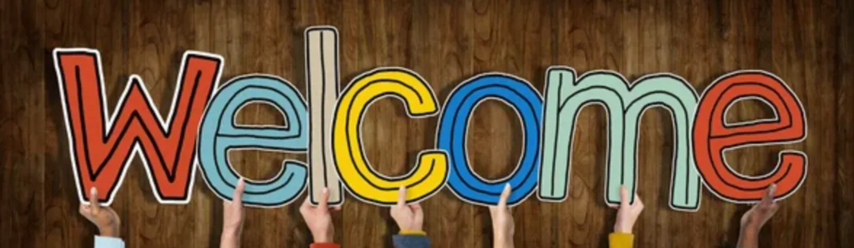 Hands holding up colorful 