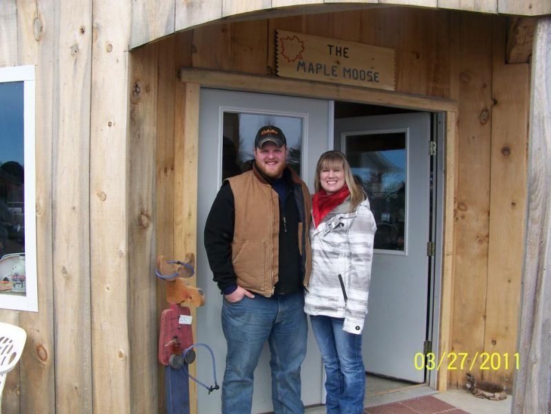 Man and woman stand outside 