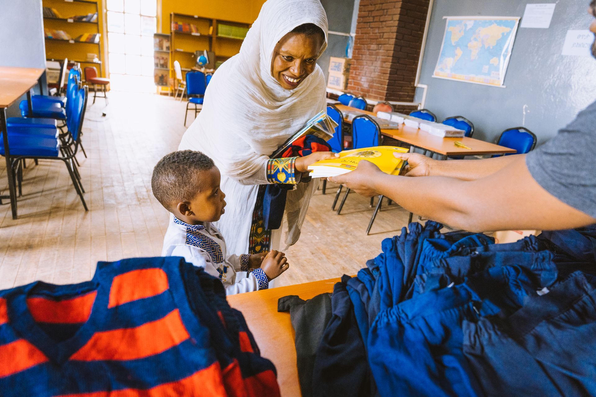 OneLove Ethiopia students smiling. One Love helps provide a safe education to students..