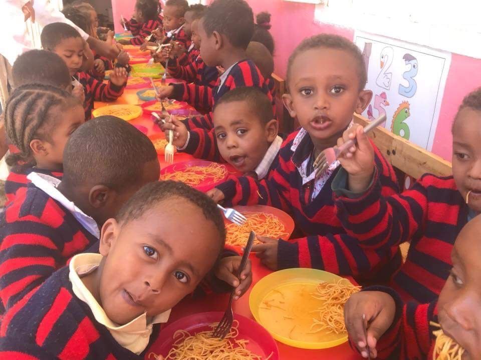 OneLove Ethiopia students smiling. One Love helps provide a safe education to students..