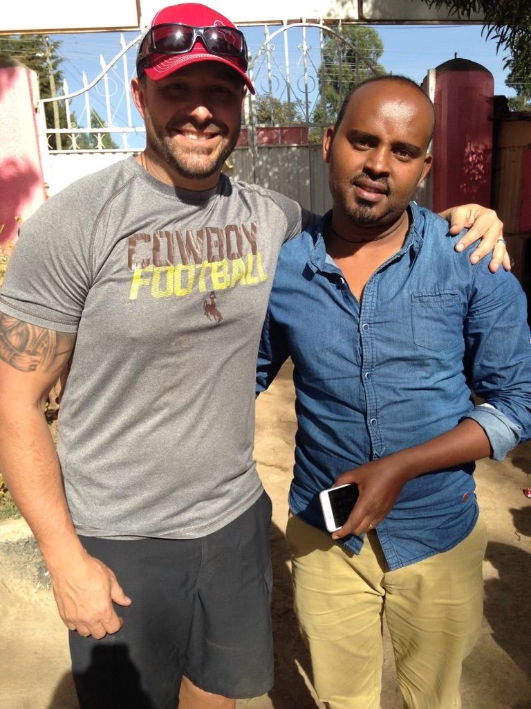 OneLove team serving the members of the community in Ethiopia and meeting the students