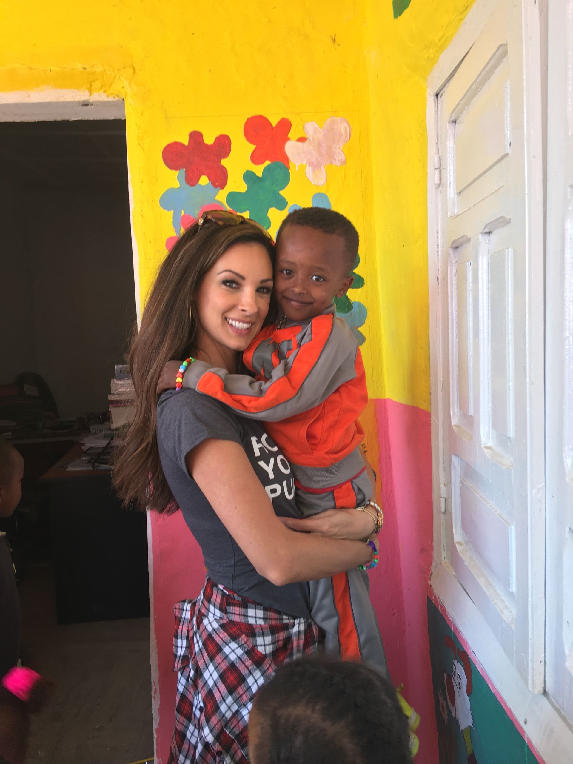 OneLove team serving the members of the community in Ethiopia and meeting the students