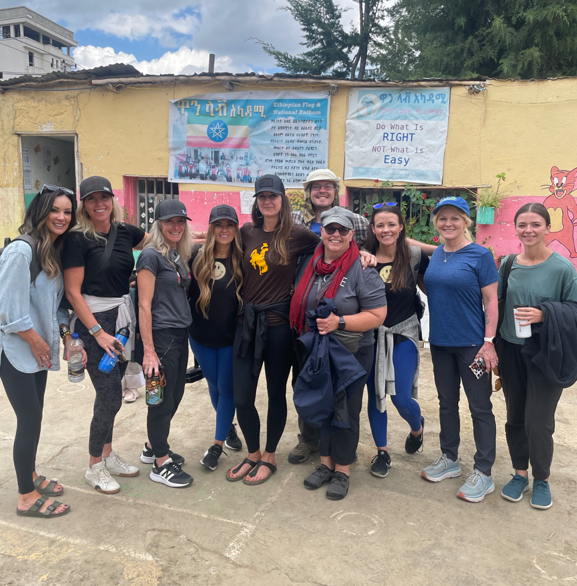 OneLove team serving the members of the community in Ethiopia and meeting the students