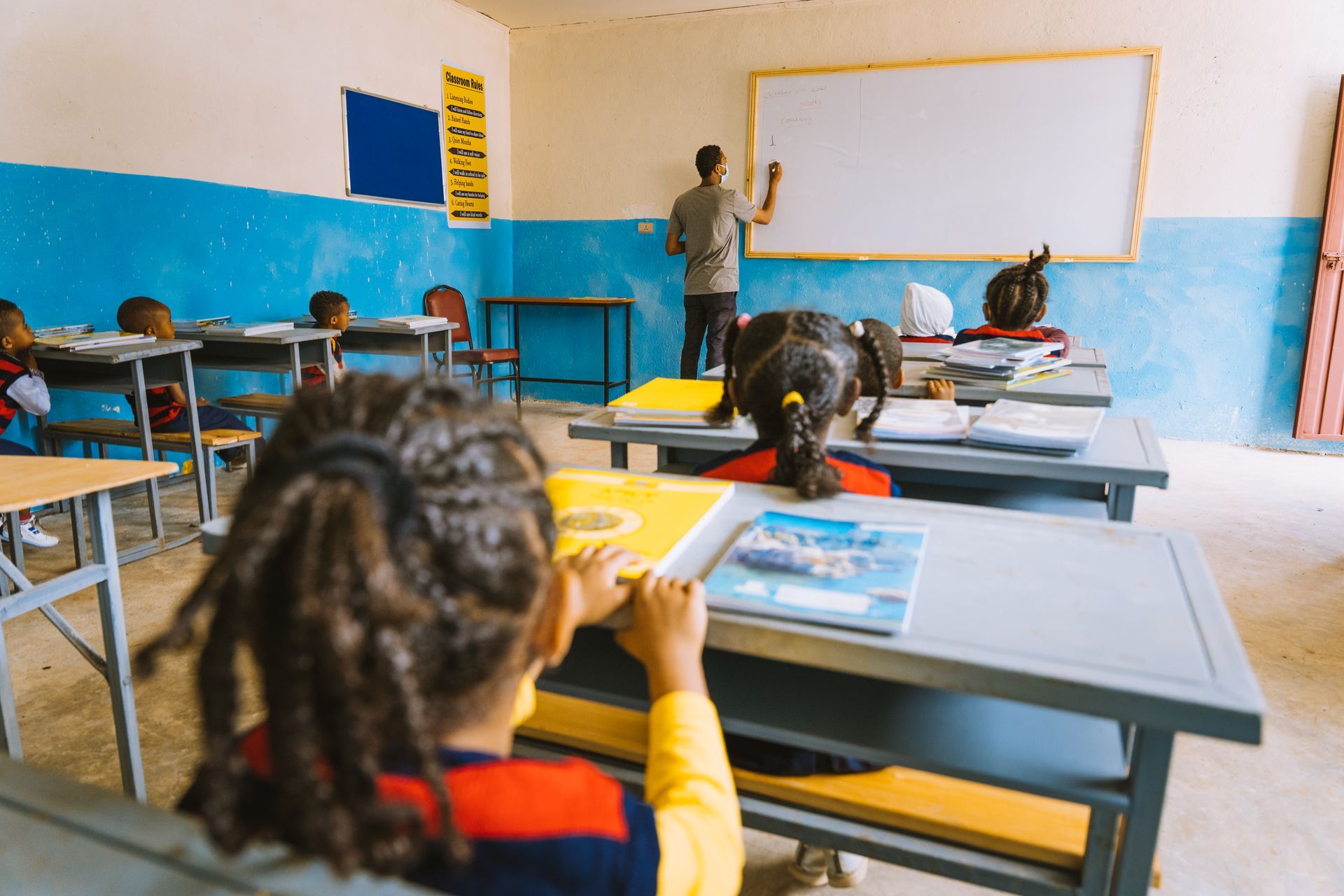 OneLove team serving the members of the community in Ethiopia and meeting the students