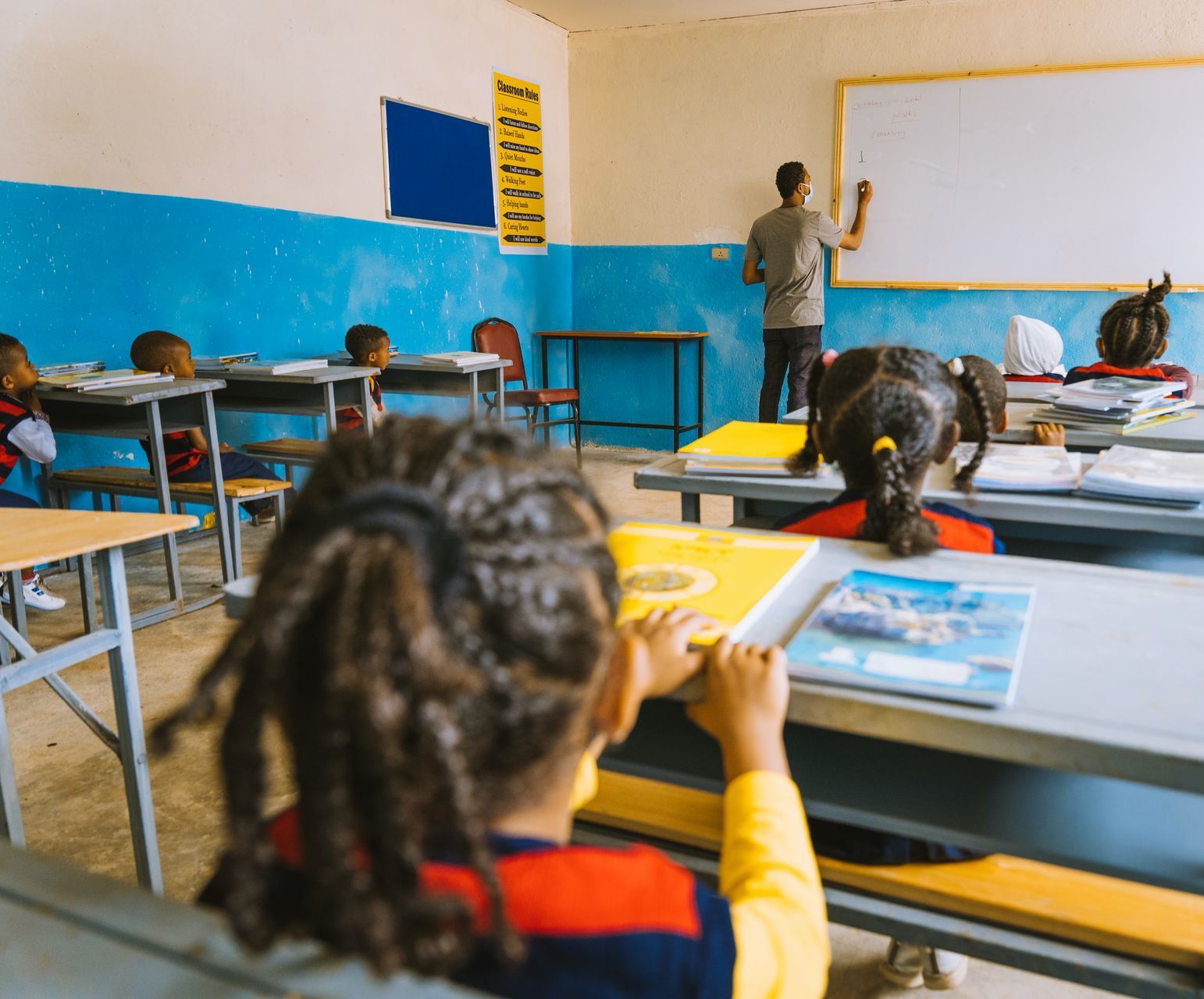 OneLove team serving the members of the community in Ethiopia and meeting the students