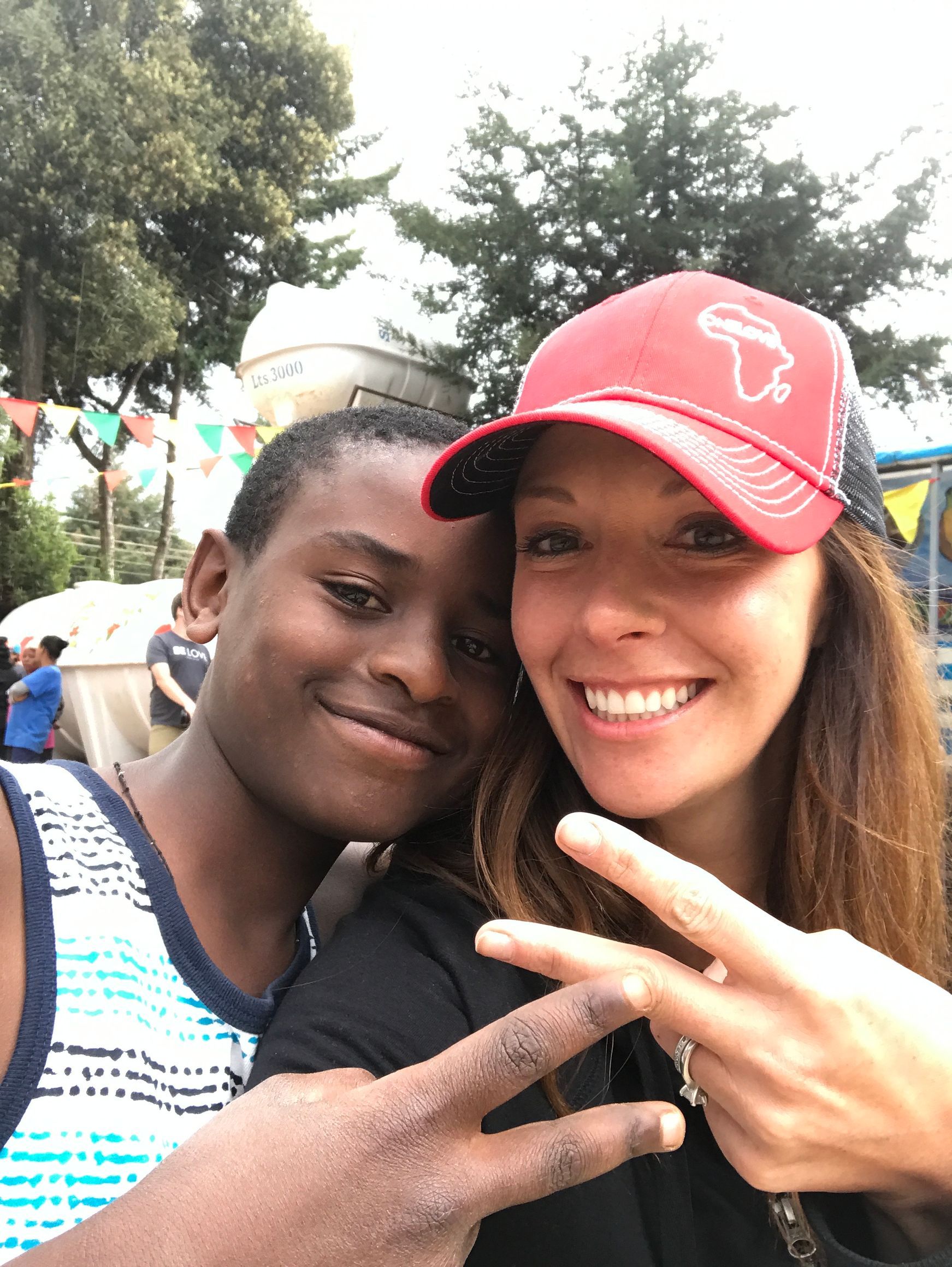 OneLove team serving the members of the community in Ethiopia and meeting the students