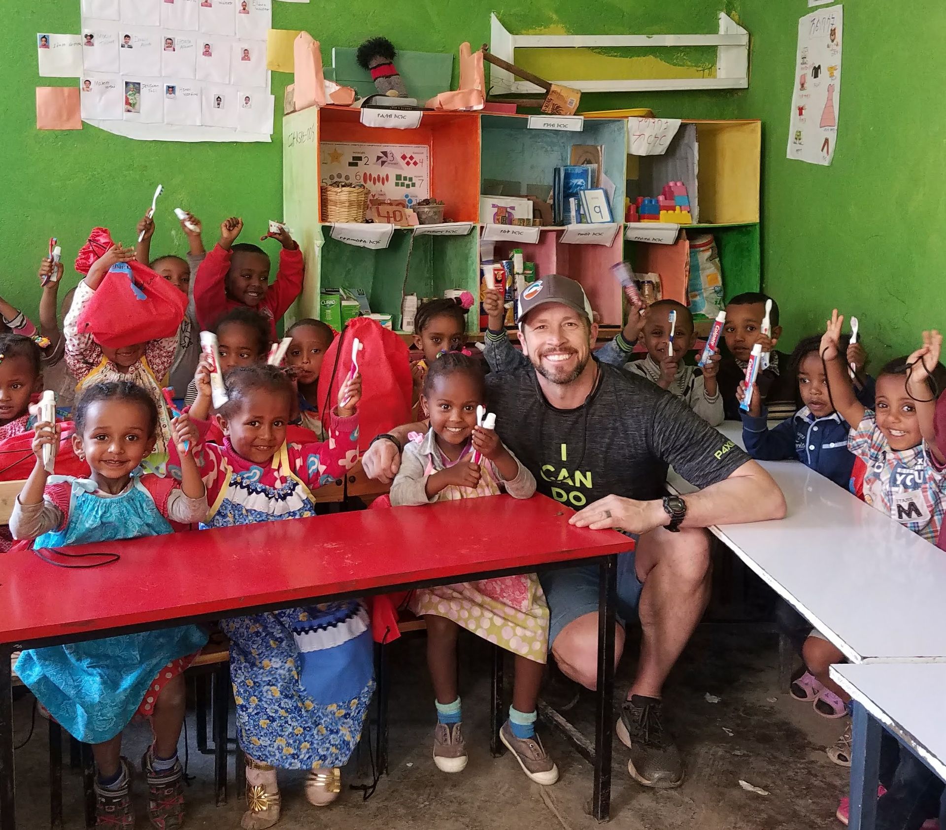 OneLove team serving the members of the community in Ethiopia and meeting the students