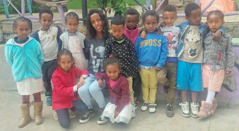 OneLove team serving the members of the community in Ethiopia and meeting the students