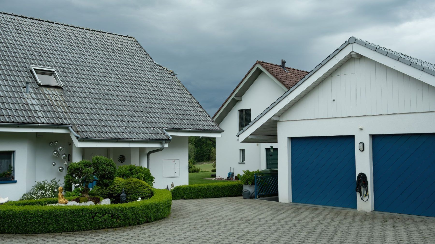 Suburban houses with driveways and double garages