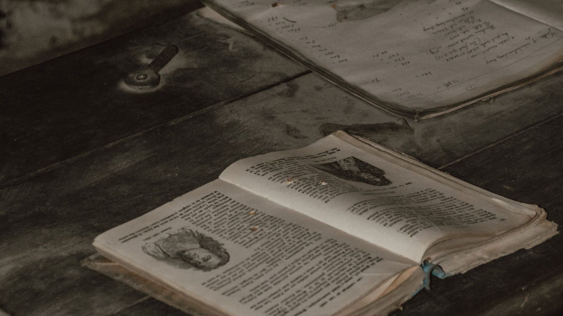 An old bound volume lying open on a table