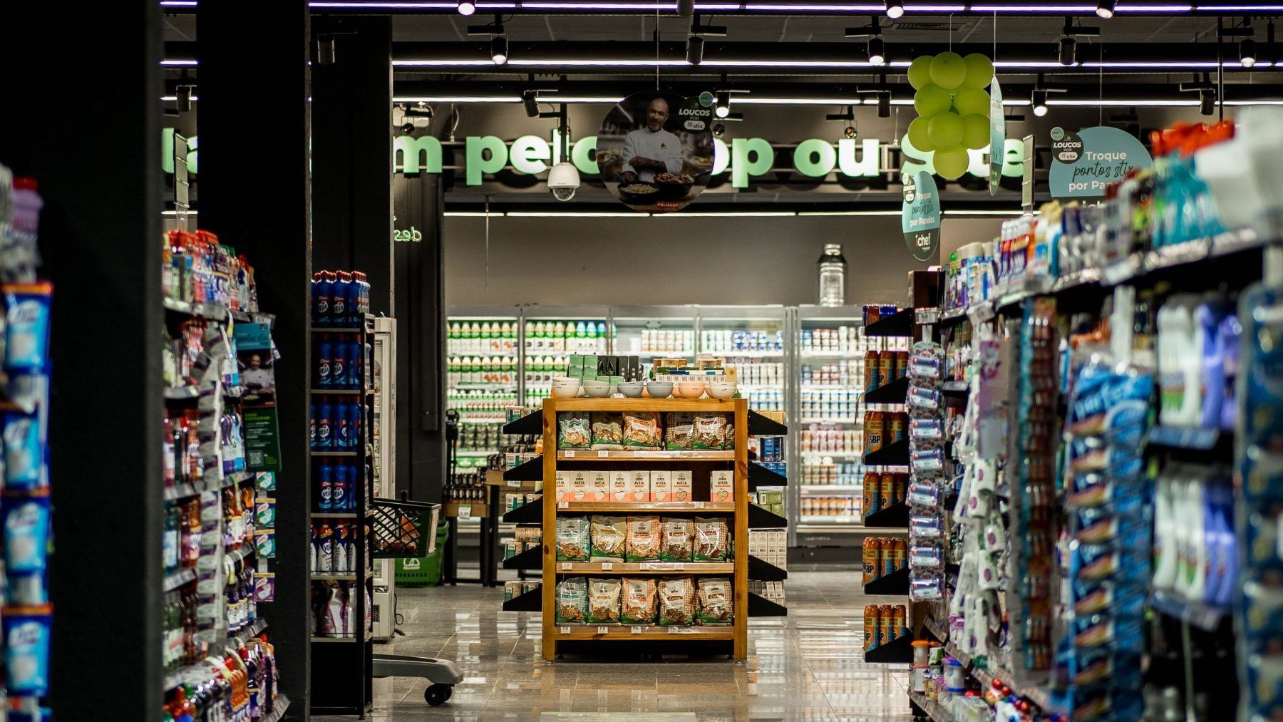 Packaged products lined along a retail shelf