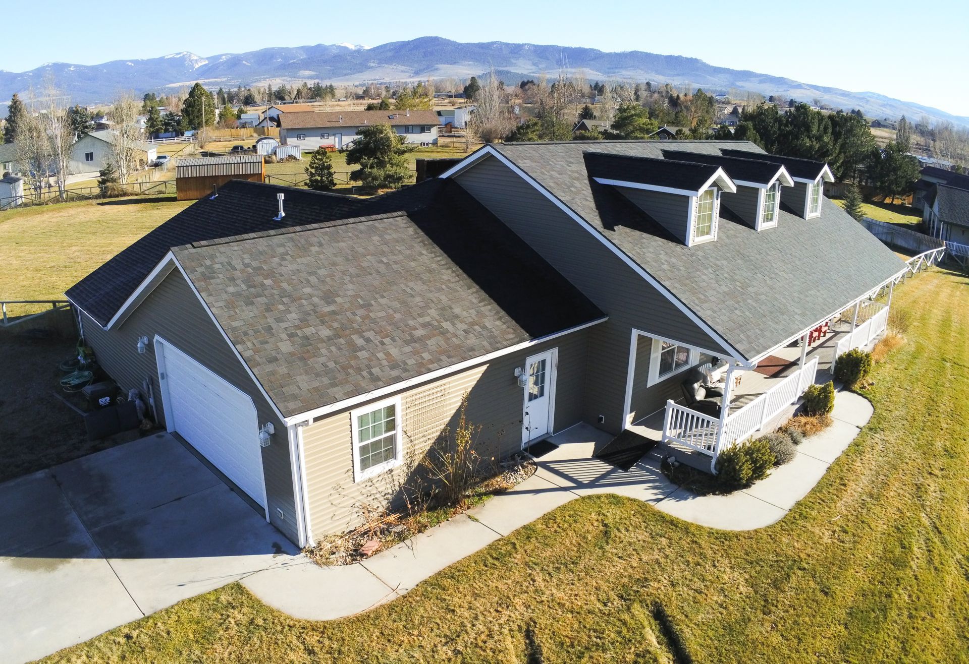 Residential roof in Schrock Roofing project imagery used for Missoula online estimate planning