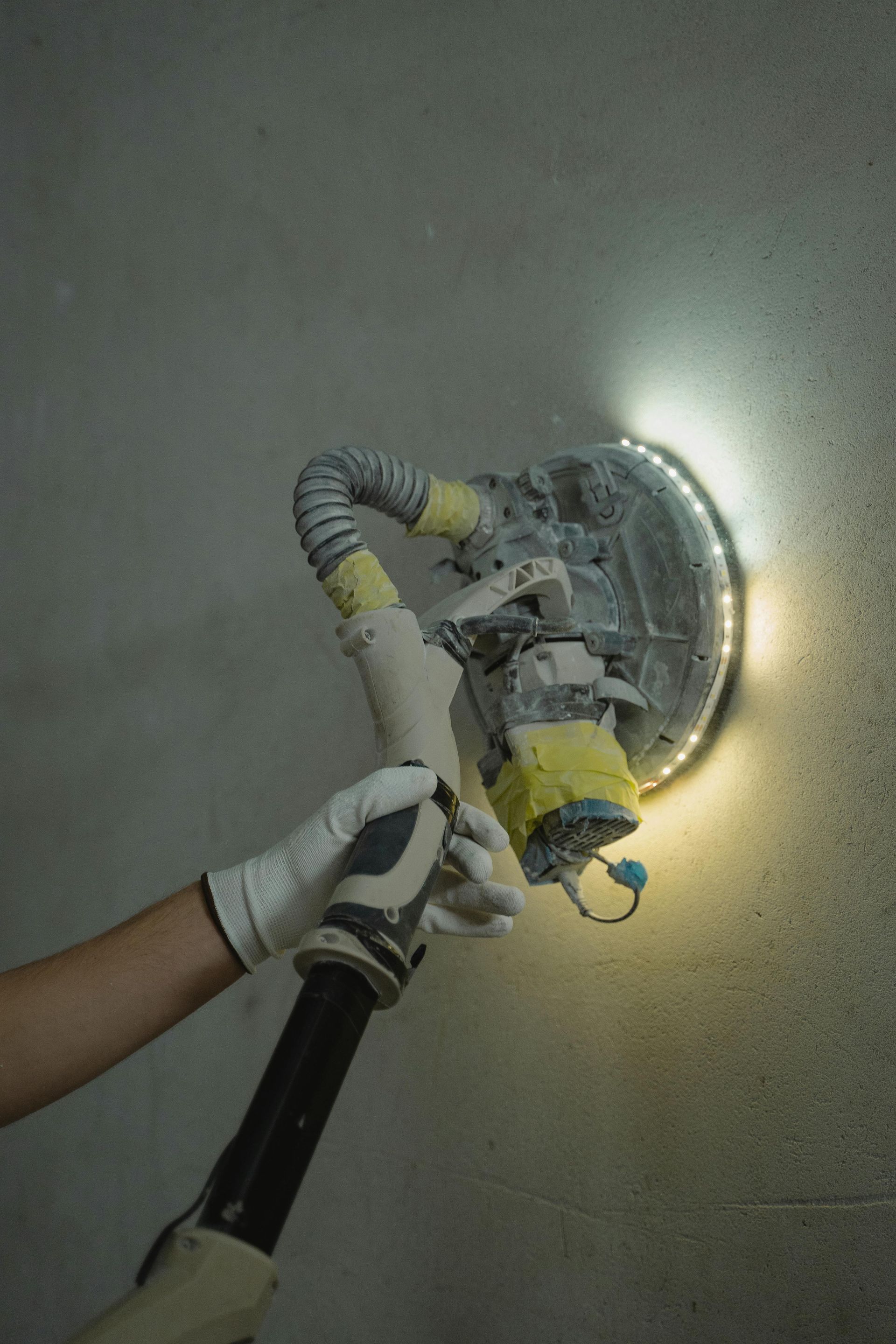 Protection of coronavirus biohazard. Men in respirators and protective suits cleaning public places