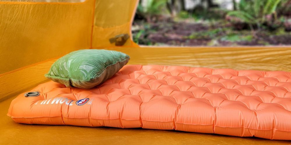 sleeping pad and pillow in a tent