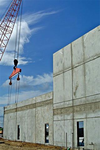 Concrete walls and a crane