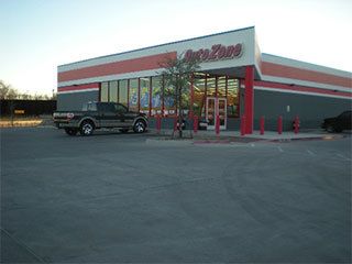 Concrete work outside an Auto Zone