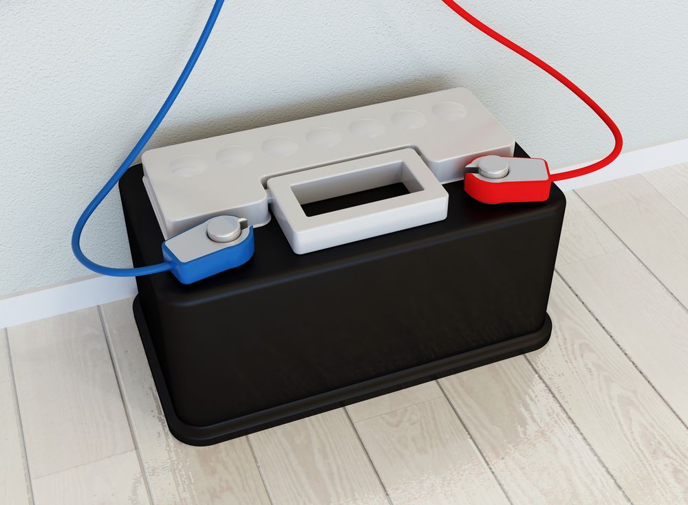 Black Box With Blue and Red Wires Connected — Paul’s Tyres & Farm Maintenance in Dubbo, NSW