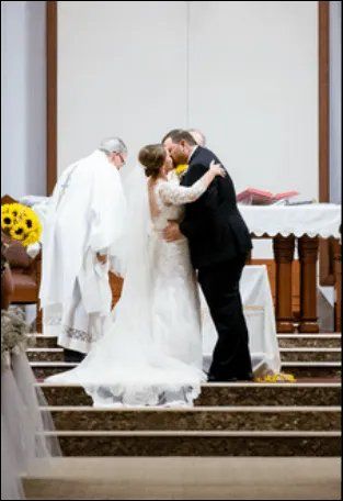 Elizabeth and mark wedding kiss