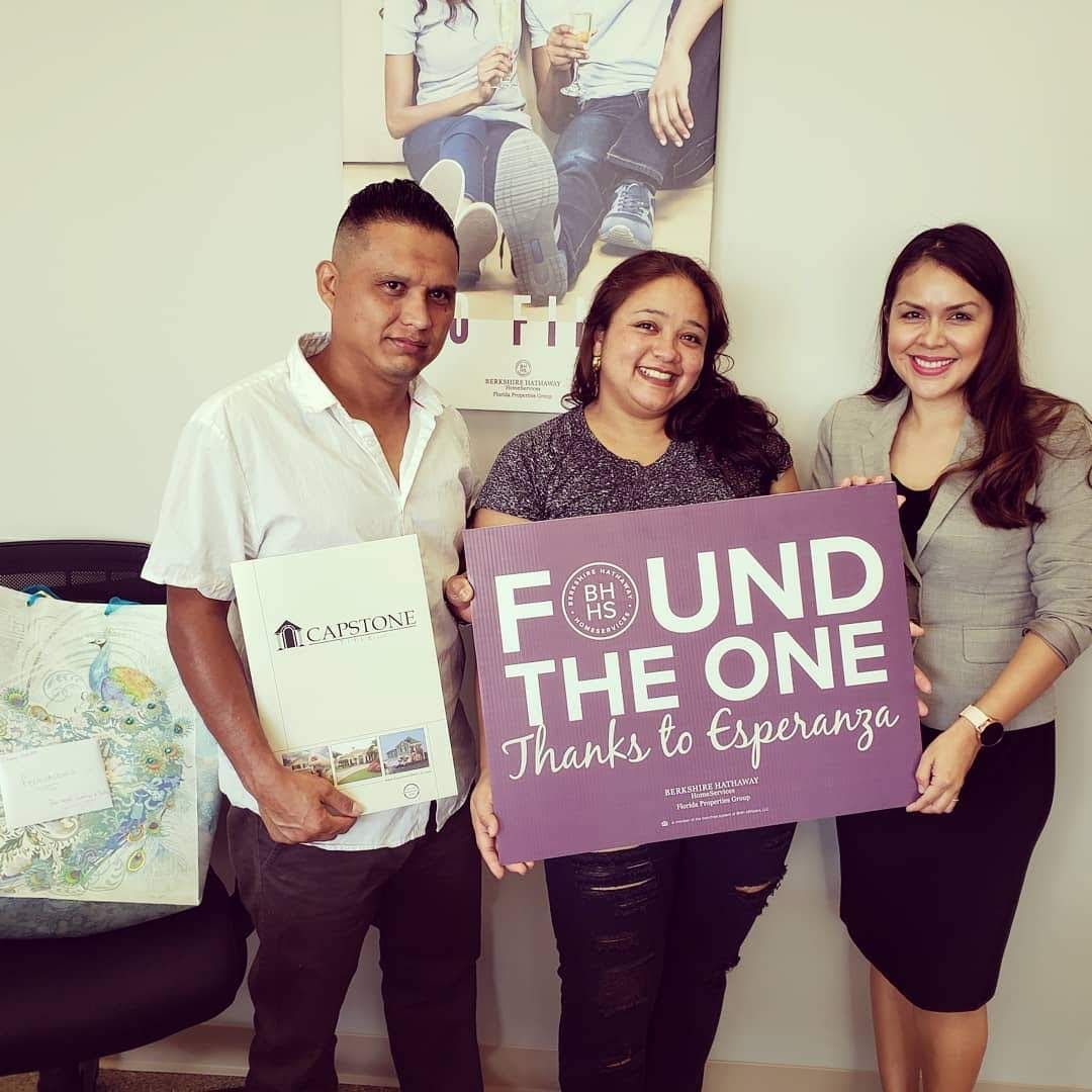 A happy couple closing on their 1st home