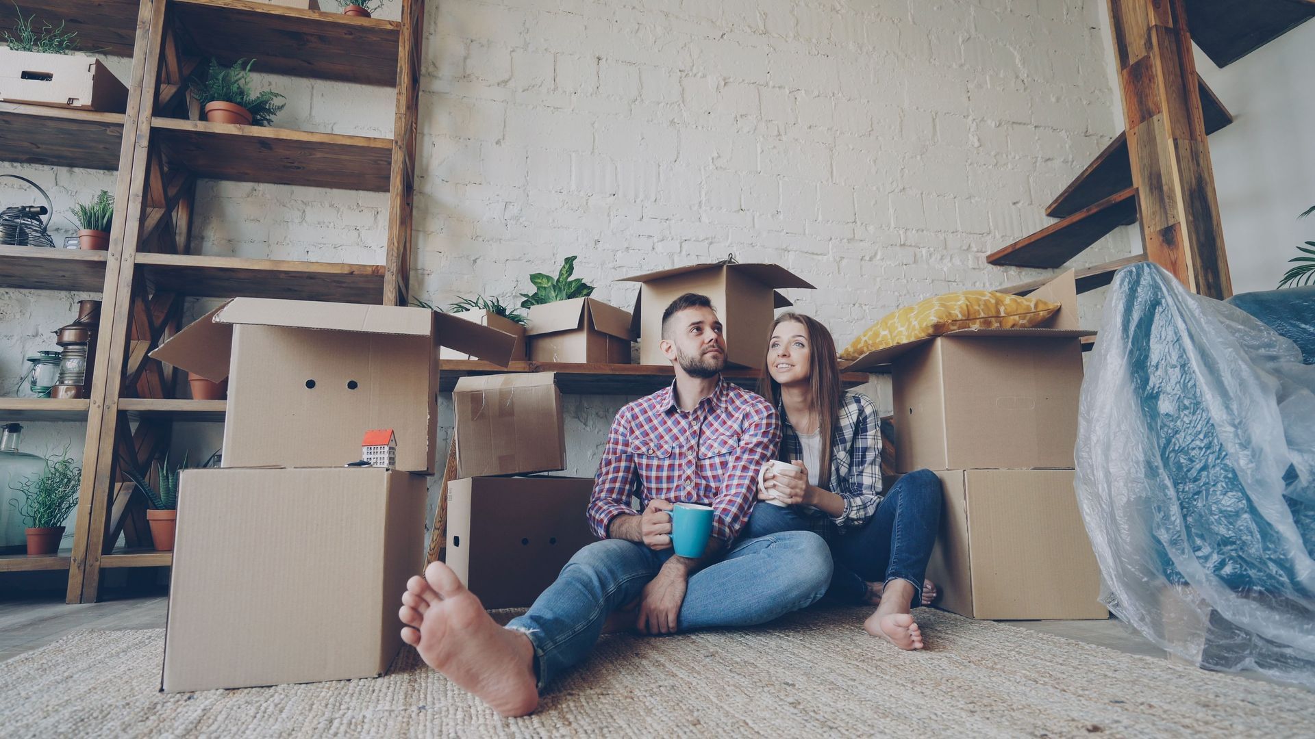 A happy couple talking about their favorite homes