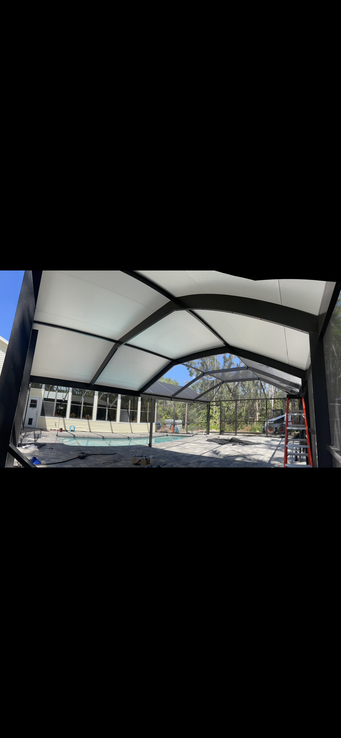 The inside of a boat with a canopy on top of it.