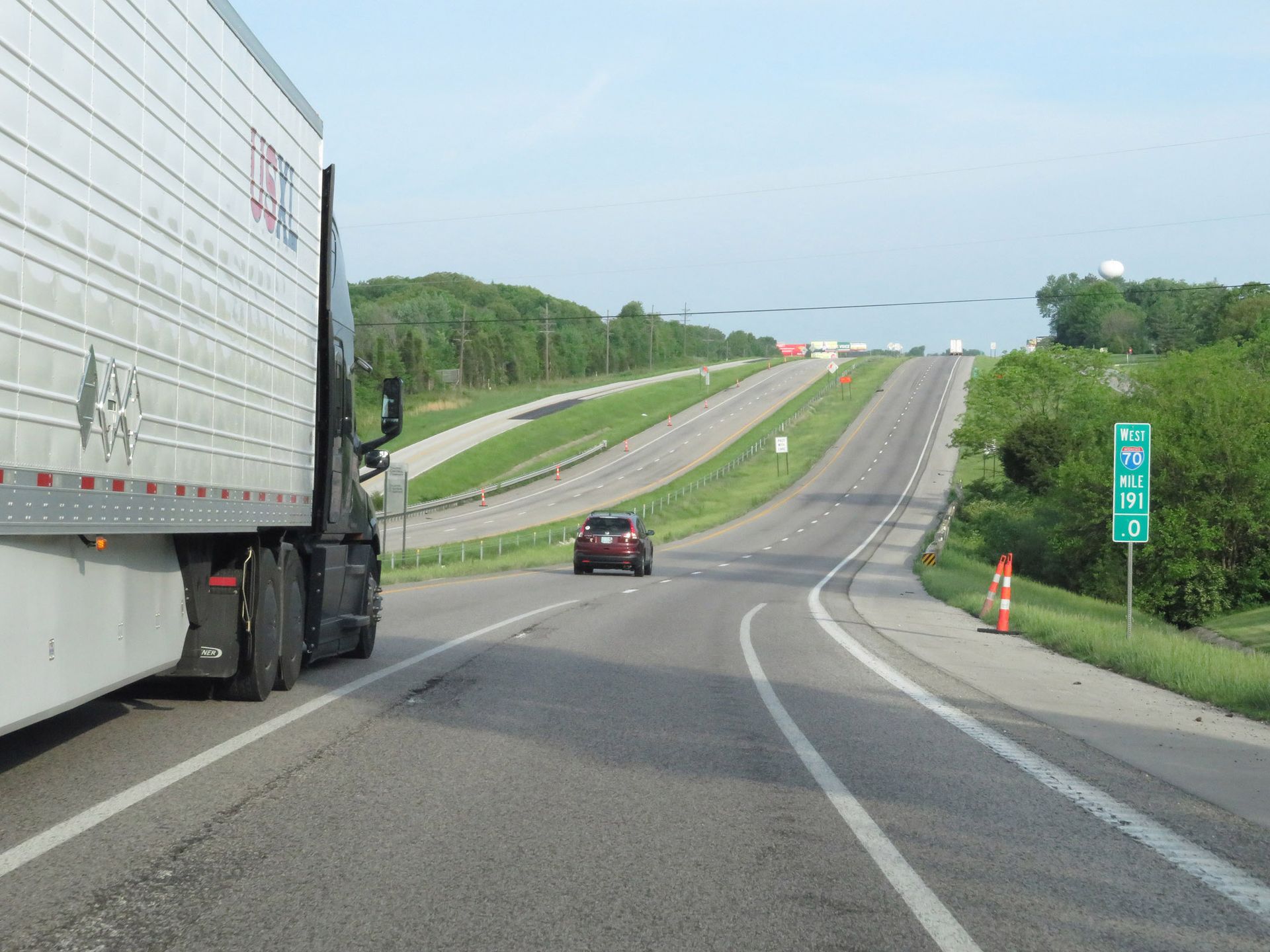 A view of i70 near Independence, MO with a freight truck driving