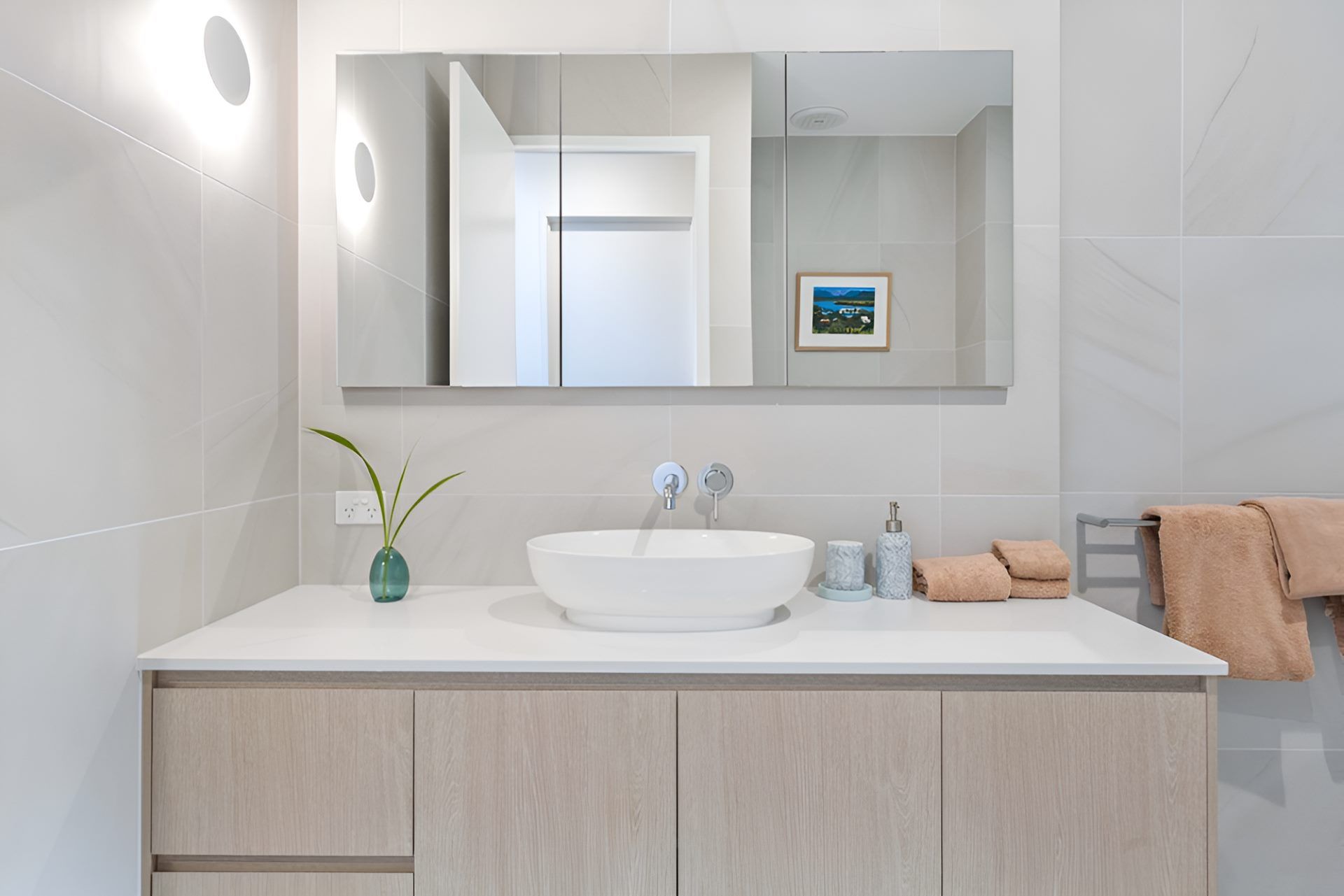 A Bathroom With A Sink and A Mirror— Kitchens by CCJS in Bungalow, QLD