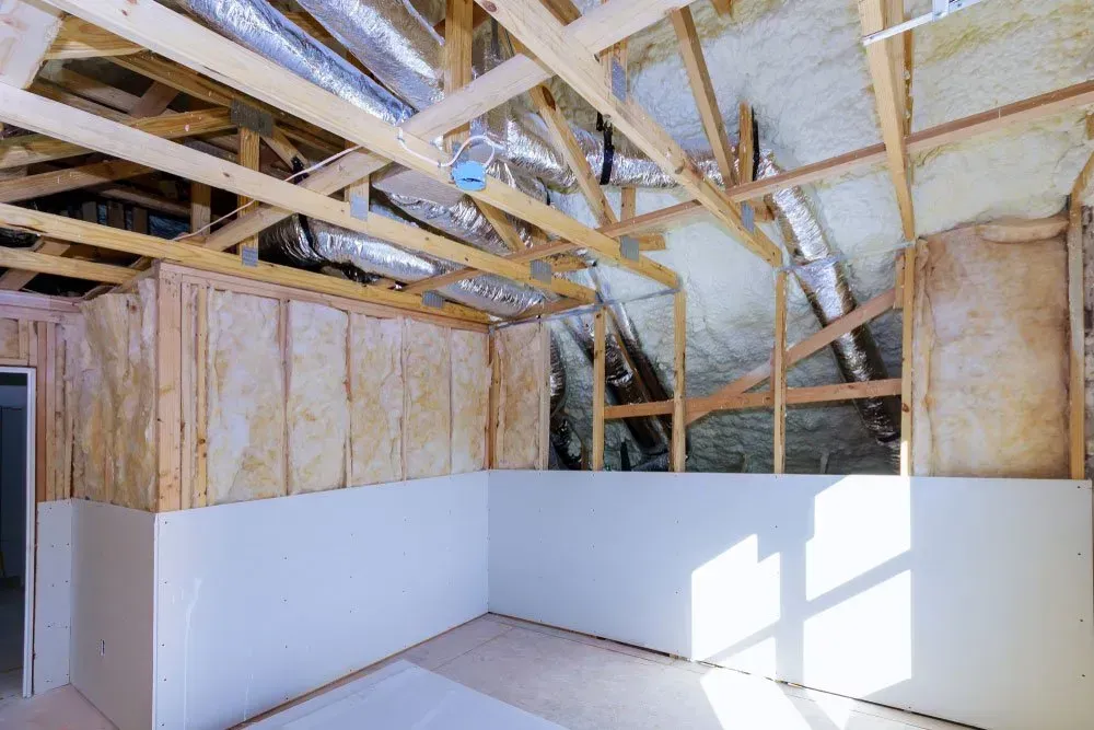 Interior of a Room Under Construction; Exposed Wooden Beams — Kev's Group QLD in Kawana, QLD