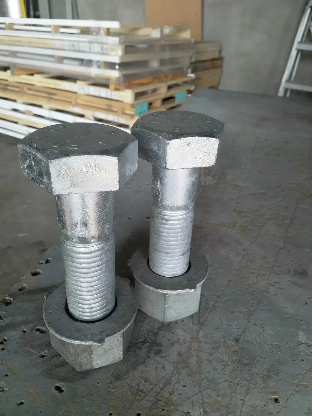 Two Large, Galvanized Metal Bolts With Hexagonal Heads — Kev's Group QLD in Kawana, QLD