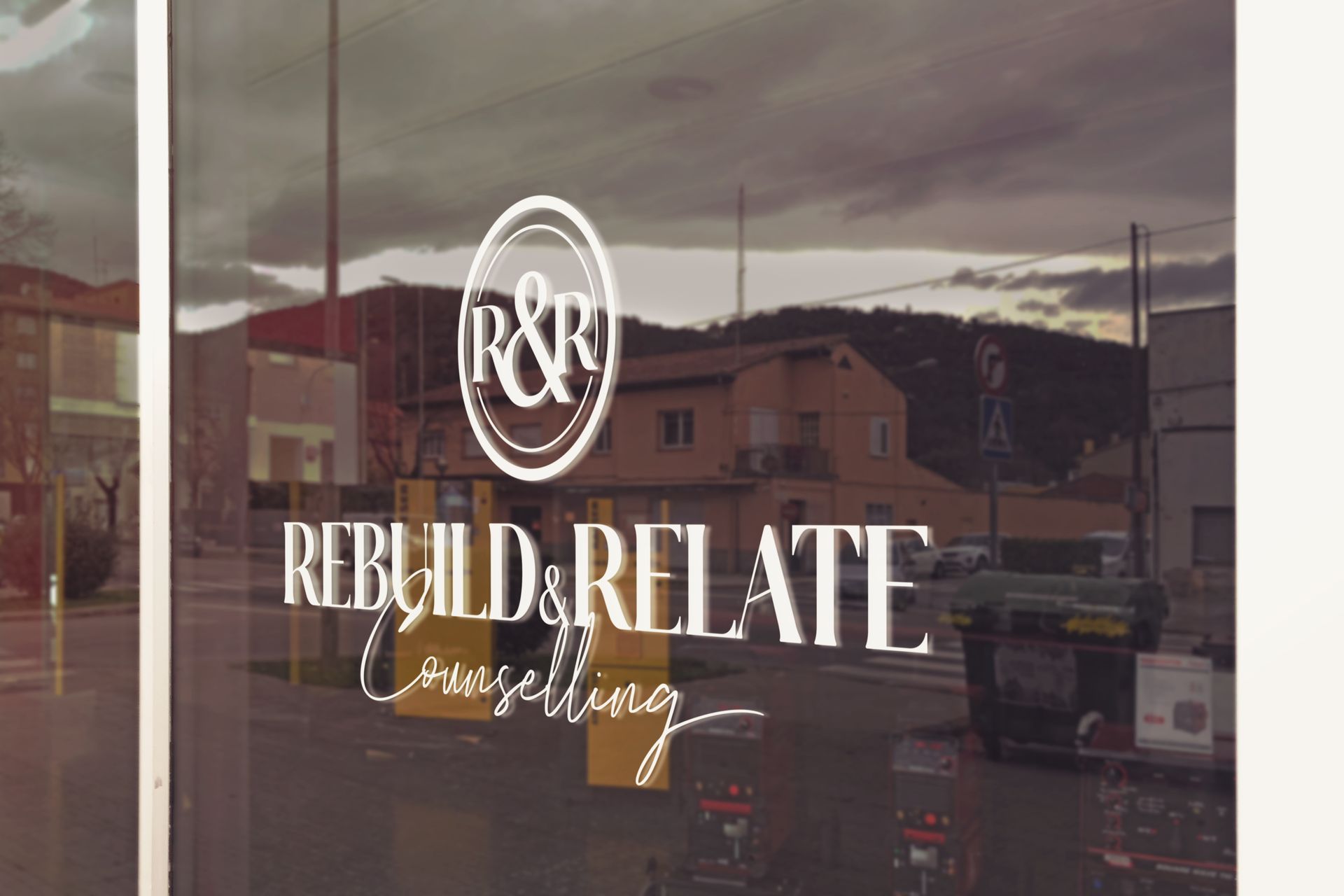 Rebuild and Relate Counselling logo on office window