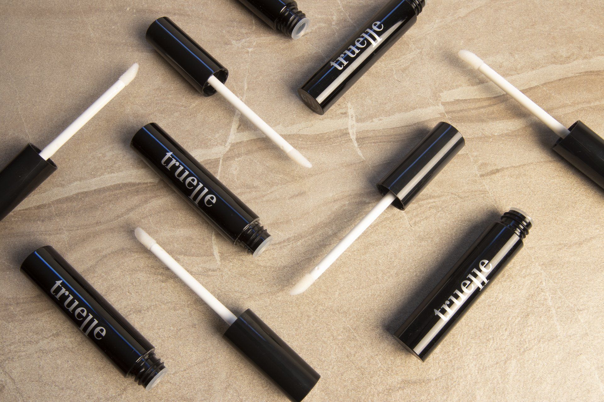 Product photography sample for a cosmetic line of products featuring Truelle.