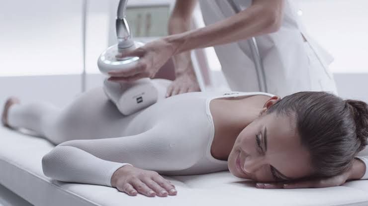 A Woman is Laying on a bed Getting a Massage — Bernadette's Beauty Care in Sarina, QLD