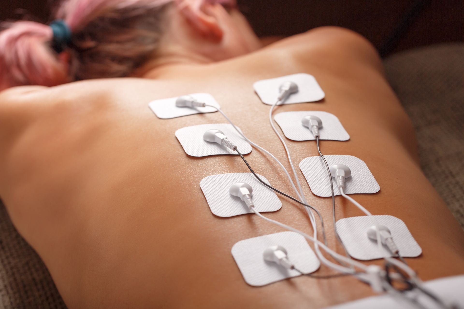 electric shock pads on back