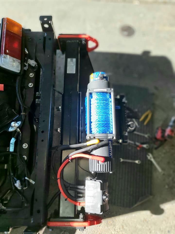 A Winch is Attached to the Back of a Truck — B & C Caravan Service Pty Ltd In Dubbo, NSW