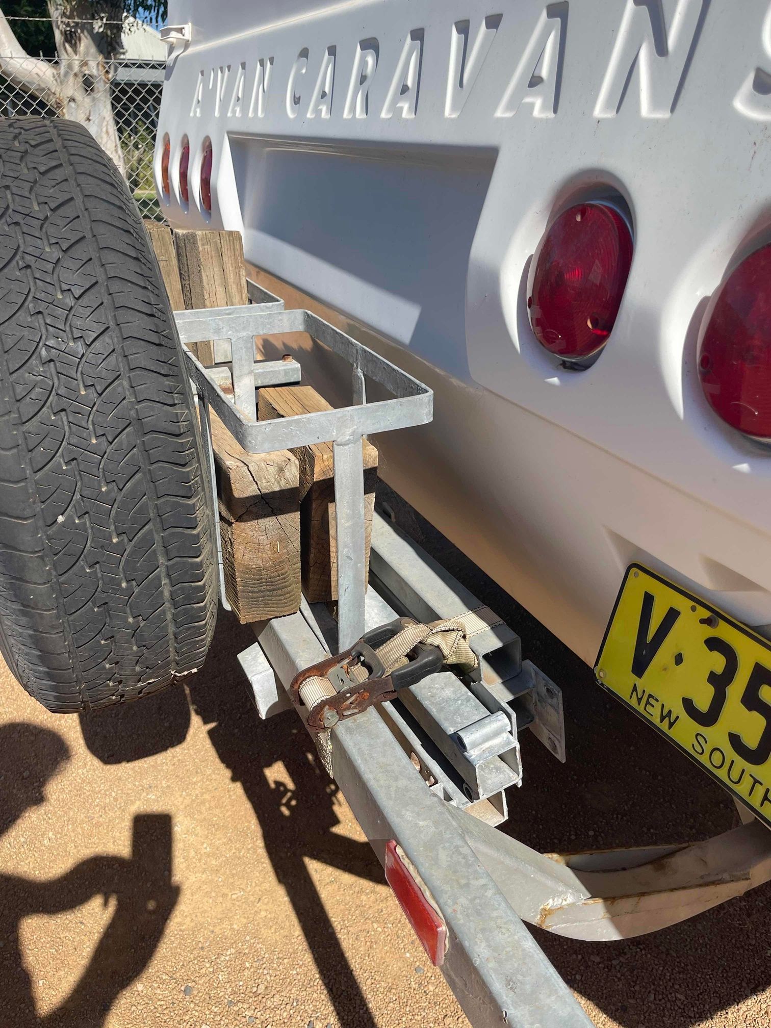 Tow Vehicle Towing a Silver Caravan Trailers — B & C Caravan Service Pty Ltd In Dubbo, NSW