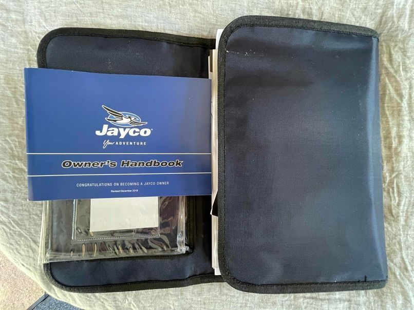 Jayco Electronic Instruction Manual in a Black Zippered Case — B & C Caravan Service Pty Ltd In Dubbo, NSW