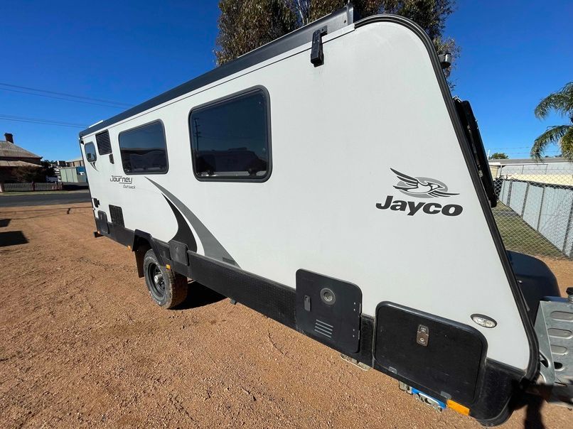 White Jayco Travel Trailer Parked — B & C Caravan Service Pty Ltd In Dubbo, NSW