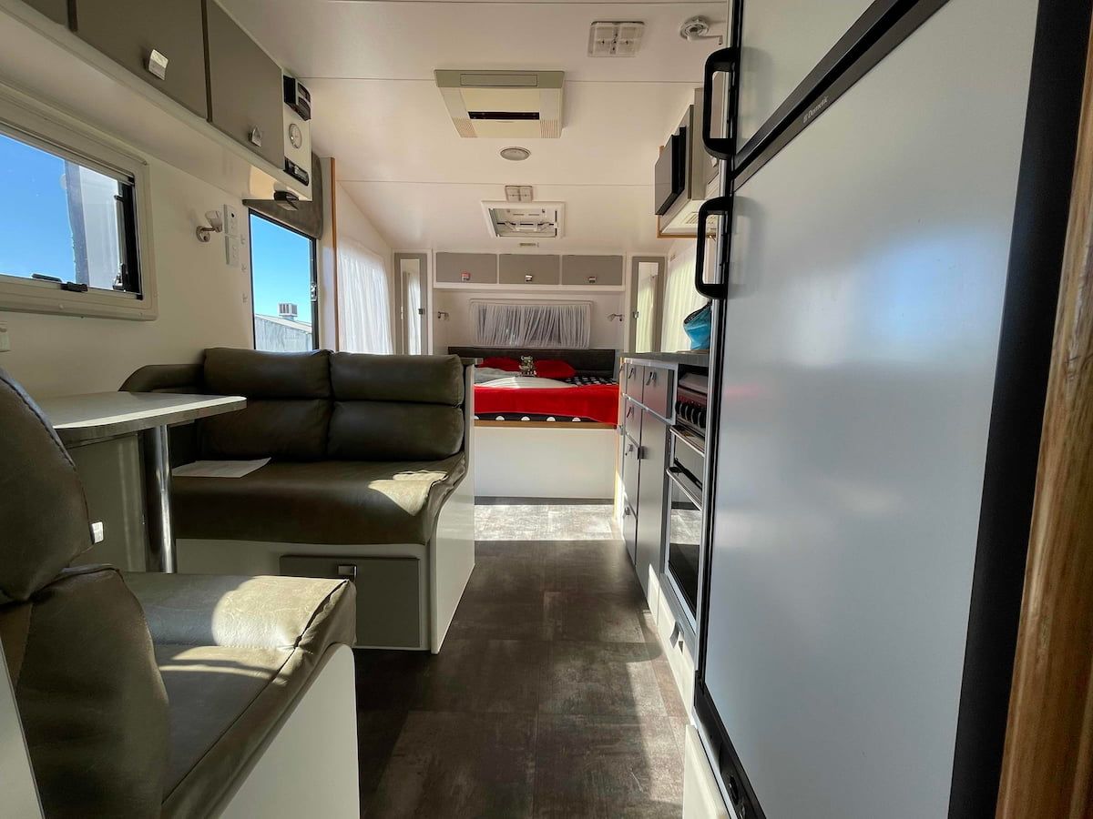 Interior of a Modern Rv With Gray Seating — B & C Caravan Service Pty Ltd In Dubbo, NSW