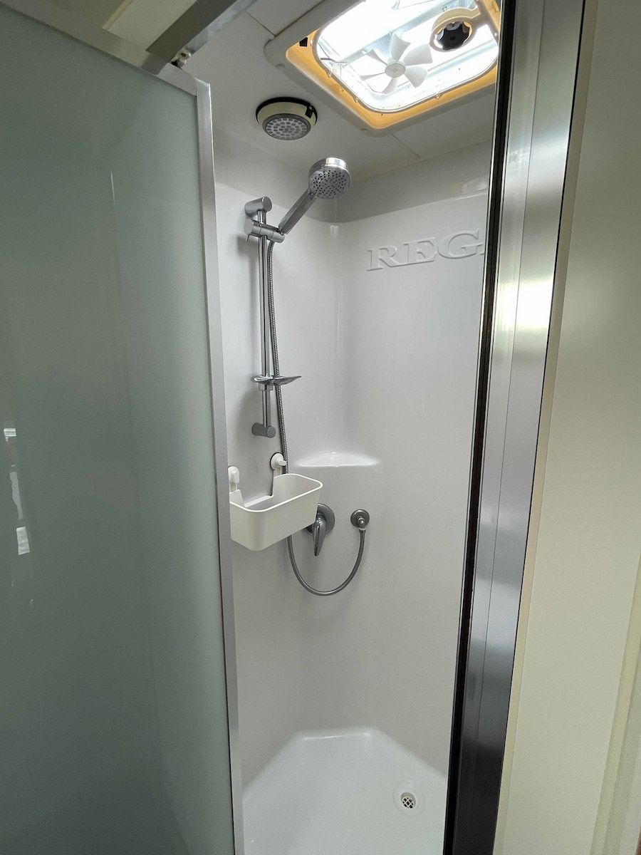 Compact Shower Stall With Handheld Showerhead, Sink — B & C Caravan Service Pty Ltd In Dubbo, NSW