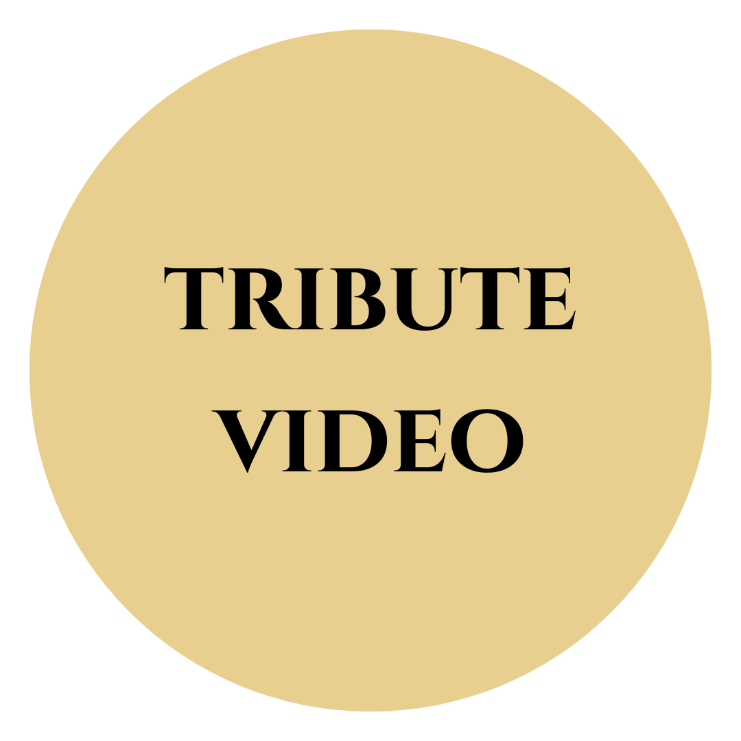 Gold circle with the words, tribute video, inside.