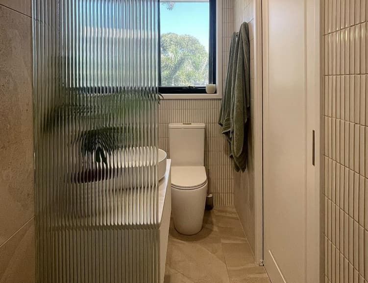 A Bathroom With A Toilet , Sink , And Shower — Penman Projects In Salamander Bay, NSW
