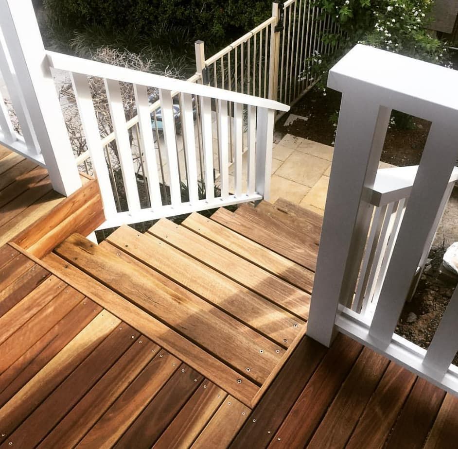 A Wooden Deck With Stairs And A White Railing — Penman Projects In Salamander Bay, NSW