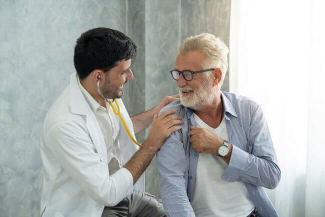 Doctor talking to a patient about Medicare in Chesterfield Township, MI