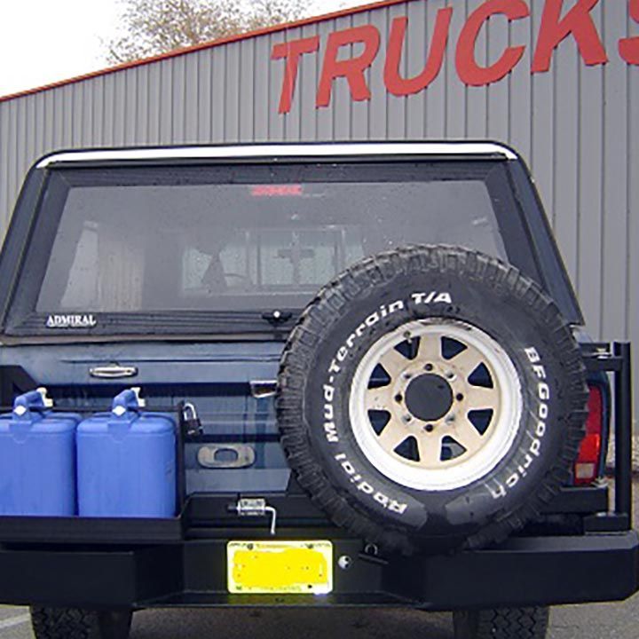 Jeep With Big Tire and Two Tubes in Albuquerque, NM - Trucks Unique