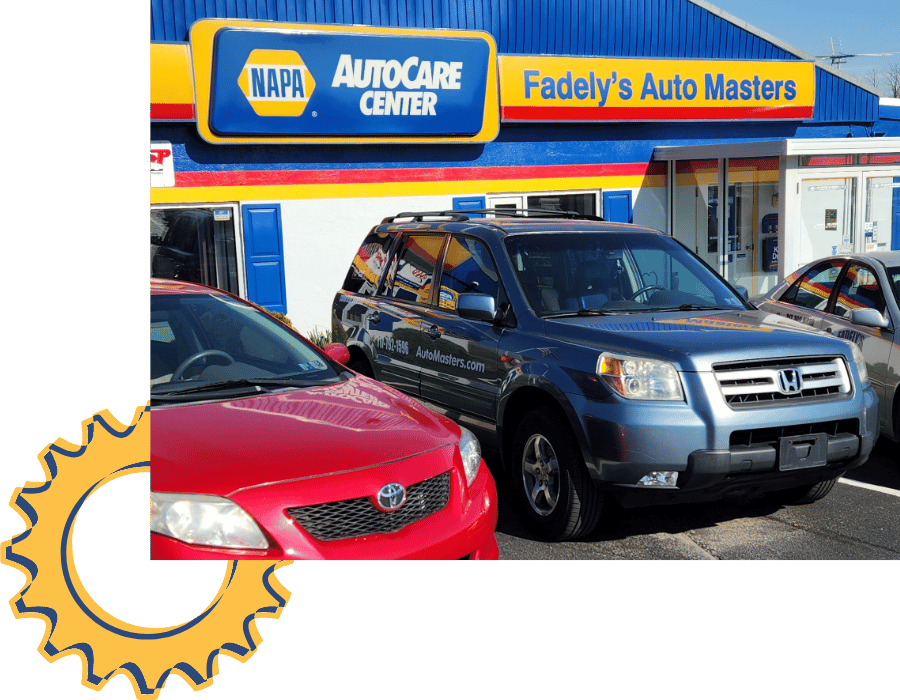 Honda SUV parked in front of Fadely’s Auto Masters NAPA AutoCare Center.